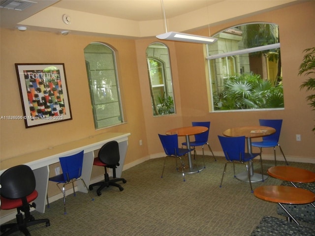 6001 SW 70th St Unit 324, South Miami, FL 33143 - carpeted dining room with baseboards