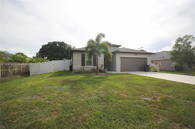 2574 SW Cameo Blvd, Port St Lucie, FL 34953 - view of front of property featuring stucco siding, driveway, a garage, and a gate