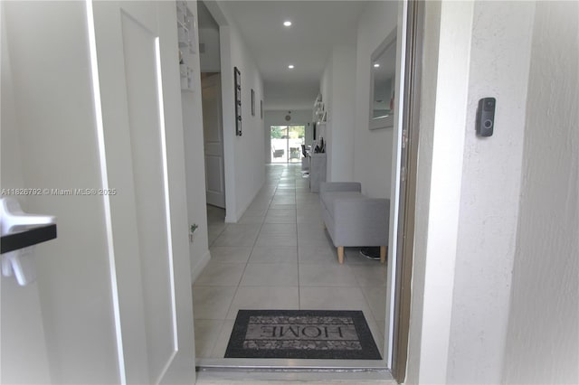 2574 SW Cameo Blvd, Port St Lucie, FL 34953 - hallway featuring light tile patterned flooring and recessed lighting