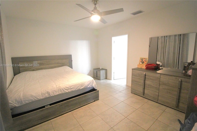 2574 SW Cameo Blvd, Port St Lucie, FL 34953 - bedroom featuring light tile patterned flooring and a ceiling fan