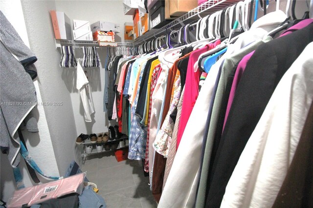 2574 SW Cameo Blvd, Port St Lucie, FL 34953 - spacious closet with tile patterned flooring