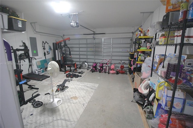 2574 SW Cameo Blvd, Port St Lucie, FL 34953 - garage featuring electric panel and a garage door opener