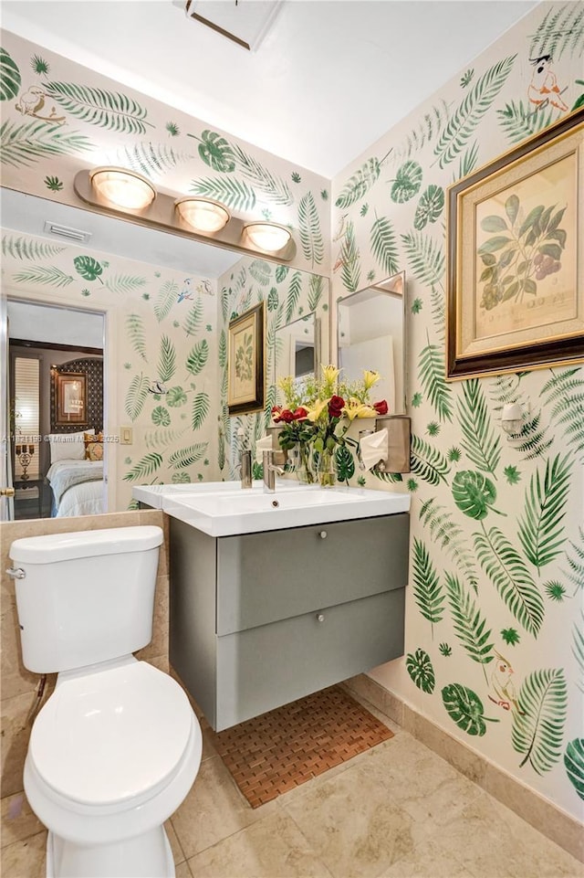 10030 SW 8th St, Pembroke Pines, FL 33025 - bathroom with wallpapered walls and vanity