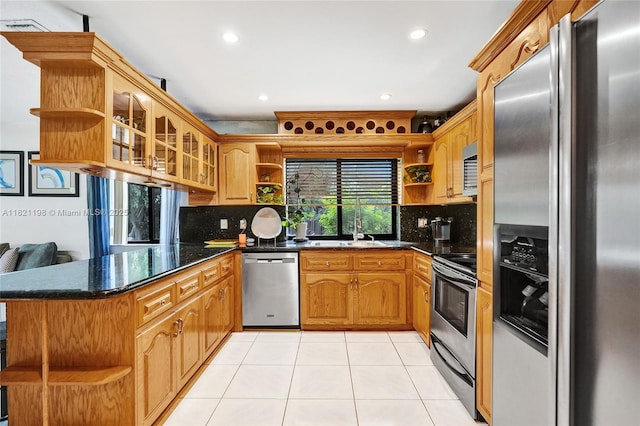 10030 SW 8th St, Pembroke Pines, FL 33025 - kitchen featuring open shelves, stainless steel appliances, a peninsula, light tile patterned floors, and backsplash