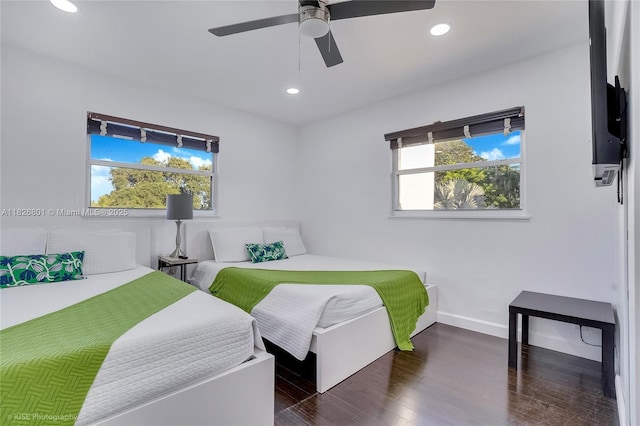 12220 Tara Dr, Plantation, FL 33325 - bedroom featuring multiple windows, recessed lighting, wood finished floors, and a ceiling fan