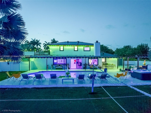 12220 Tara Dr, Plantation, FL 33325 - rear view of house with a patio and a chimney