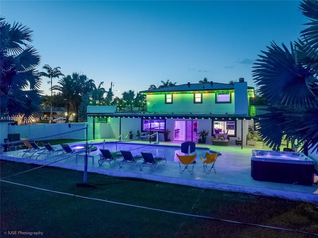 12220 Tara Dr, Plantation, FL 33325 - rear view of house featuring a patio, stucco siding, and a chimney