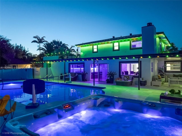 12220 Tara Dr, Plantation, FL 33325 - view of swimming pool with an outdoor hot tub and a patio