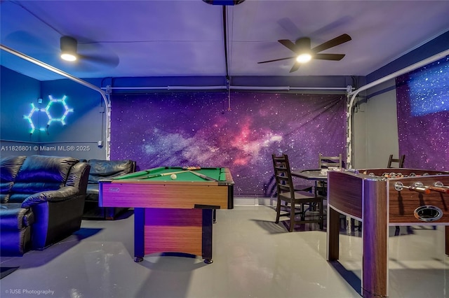 12220 Tara Dr, Plantation, FL 33325 - game room featuring a garage, wallpapered walls, billiards table, ceiling fan, and concrete floors