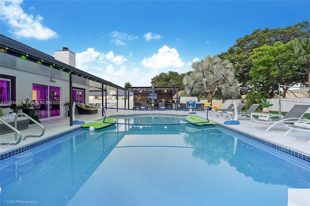 12220 Tara Dr, Plantation, FL 33325 - view of swimming pool featuring a patio and a pergola
