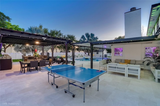 12220 Tara Dr, Plantation, FL 33325 - fenced backyard with an outdoor hangout area, a pergola, outdoor dining area, and a patio