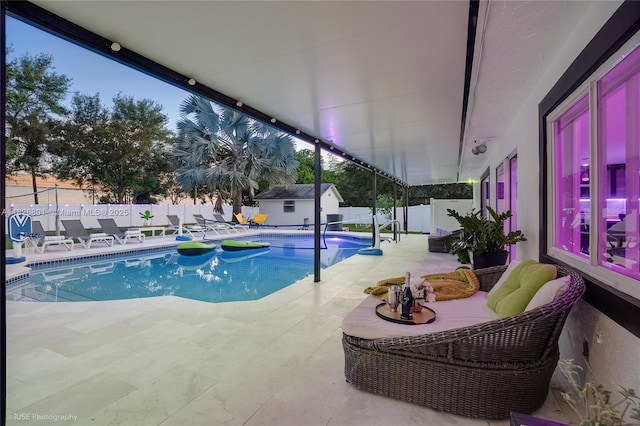 12220 Tara Dr, Plantation, FL 33325 - view of swimming pool with a fenced backyard, a patio area, and an outdoor structure