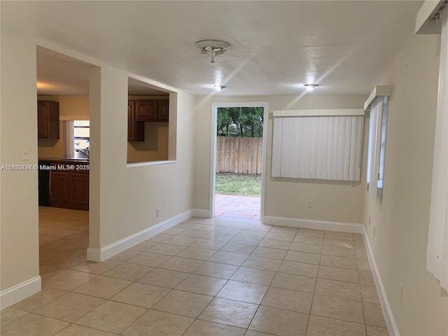 1624 NE 48th Ct, Pompano Beach, FL 33064 - unfurnished room featuring light tile patterned flooring and baseboards