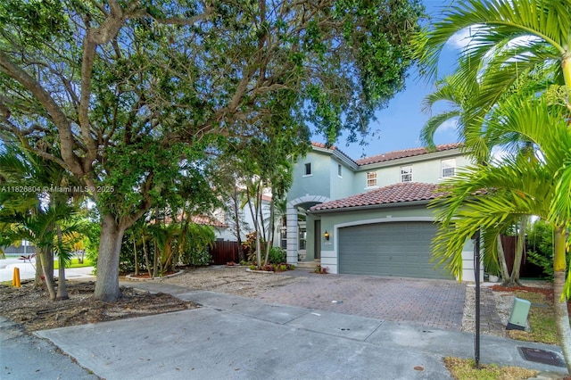 6425 SW 164th Ave, Miami, FL 33193 - mediterranean / spanish house with a tiled roof, driveway, and stucco siding