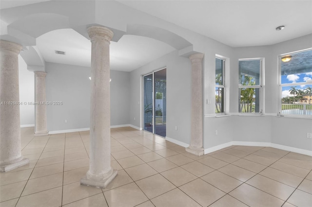 6425 SW 164th Ave, Miami, FL 33193 - empty room with ornate columns, healthy amount of natural light, and light tile patterned flooring