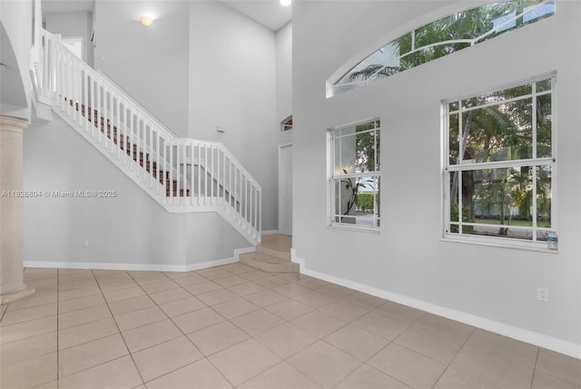 6425 SW 164th Ave, Miami, FL 33193 - foyer entrance with stairway, a towering ceiling, and tile patterned floors
