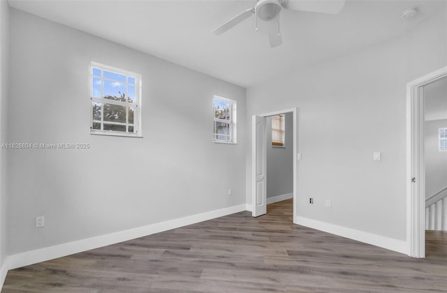 6425 SW 164th Ave, Miami, FL 33193 - unfurnished bedroom featuring wood finished floors and a ceiling fan