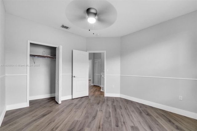6425 SW 164th Ave, Miami, FL 33193 - unfurnished bedroom with wood finished floors, a closet, and a ceiling fan