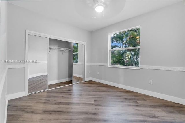 6425 SW 164th Ave, Miami, FL 33193 - unfurnished bedroom with a closet, wood finished floors, and a ceiling fan