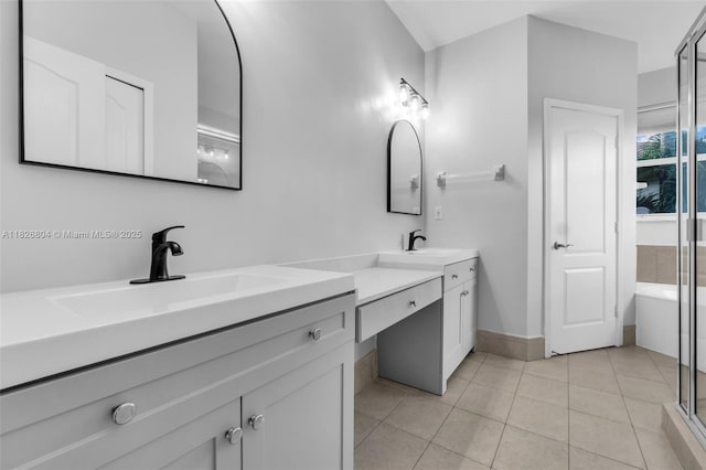 6425 SW 164th Ave, Miami, FL 33193 - bathroom with vanity, tile patterned floors, and a tub to relax in