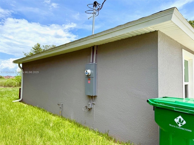 5029 N Dogwood Cir, La Belle, FL 33935 - view of property exterior featuring stucco siding