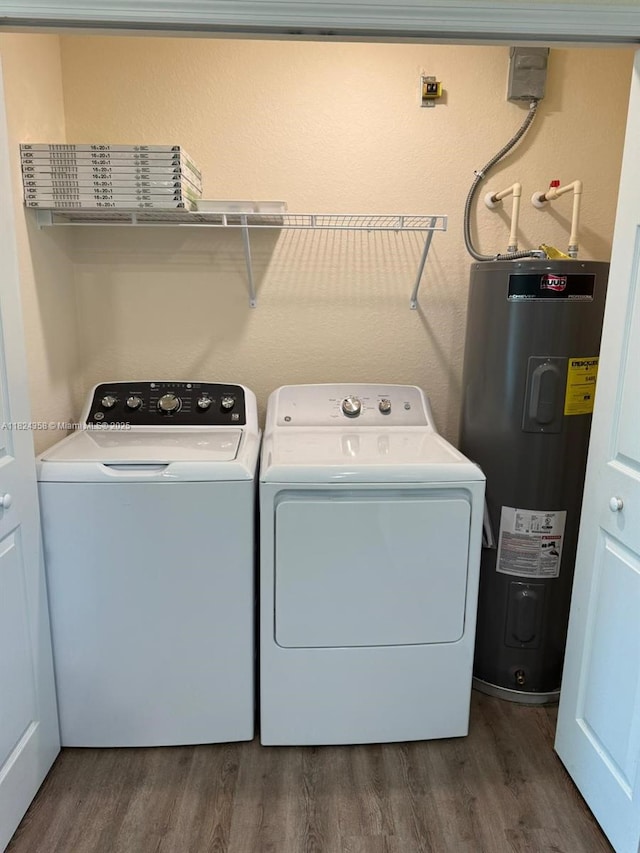 5029 N Dogwood Cir, La Belle, FL 33935 - washroom with water heater, dark wood-style flooring, and washing machine and clothes dryer