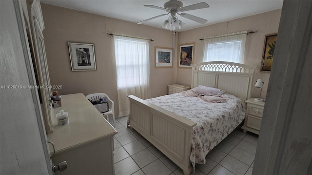 3640 SW 13th St, Miami, FL 33145 - bedroom with multiple windows, light tile patterned floors, and ceiling fan