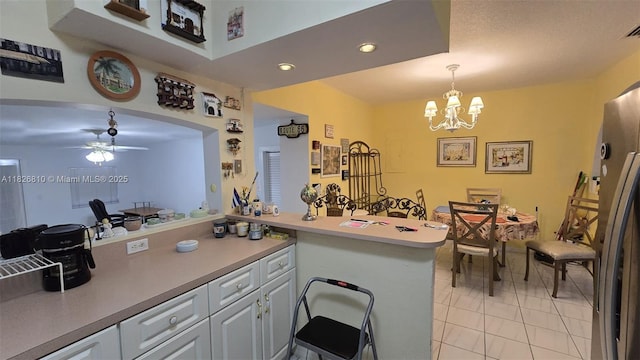 3640 SW 13th St, Miami, FL 33145 - kitchen featuring a ceiling fan, hanging light fixtures, white cabinetry, light countertops, and recessed lighting