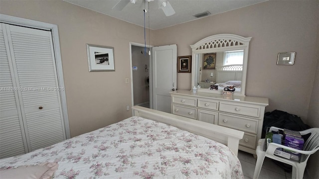 3640 SW 13th St, Miami, FL 33145 - tiled bedroom featuring a ceiling fan and a closet