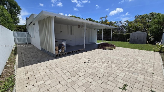 3640 SW 13th St, Miami, FL 33145 - fenced backyard featuring a patio area and a storage shed