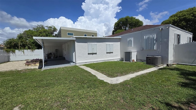3640 SW 13th St, Miami, FL 33145 - rear view of house featuring stucco siding