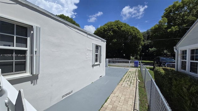 3640 SW 13th St, Miami, FL 33145 - view of side of property featuring stucco siding
