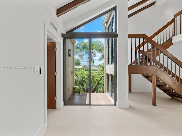 8075 SW 86th Ter, Miami, FL 33143 - doorway to outside featuring stairs and baseboards