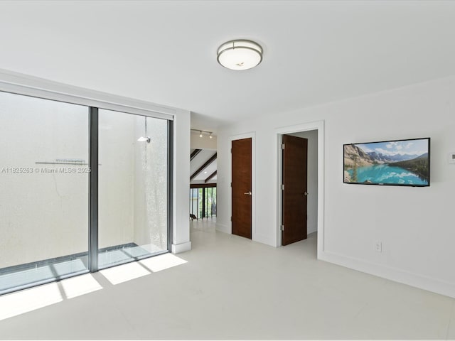 8075 SW 86th Ter, Miami, FL 33143 - unfurnished room with baseboards
