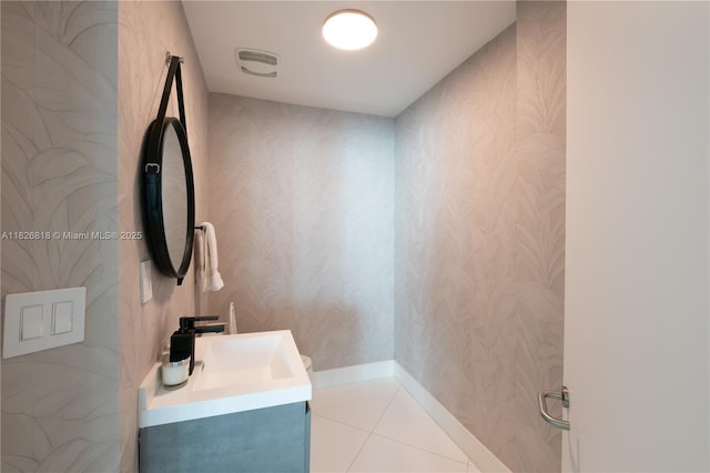 3131 NE 188th St Unit 2-605, Aventura, FL 33180 - bathroom with wallpapered walls, vanity, and tile patterned floors