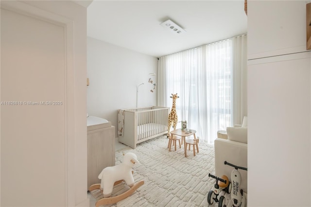 3131 NE 188th St Unit 2-605, Aventura, FL 33180 - bedroom with a crib