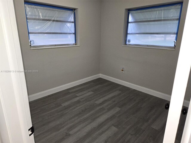 7600 Simms St, Hollywood, FL 33024 - spare room featuring dark wood-type flooring and baseboards