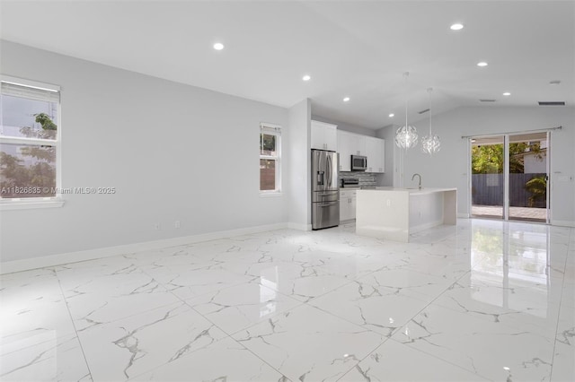 525 El Prado, West Palm Beach, FL 33405 - unfurnished living room featuring lofted ceiling, recessed lighting, and light marble finish flooring