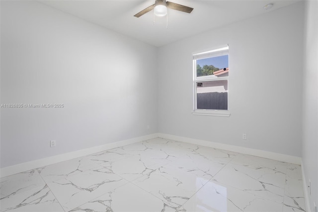 525 El Prado, West Palm Beach, FL 33405 - unfurnished room with ceiling fan, marble finish floors, and a smoke detector