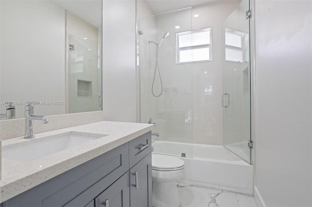 525 El Prado, West Palm Beach, FL 33405 - bathroom with vanity, bath / shower combo with glass door, and marble finish floors