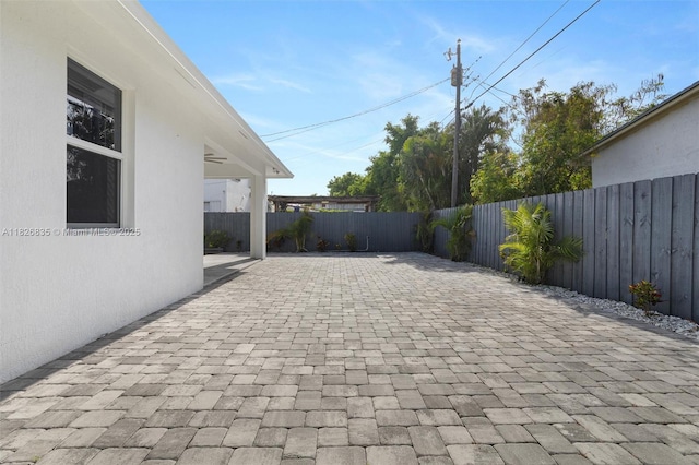 525 El Prado, West Palm Beach, FL 33405 - fenced backyard featuring a patio area