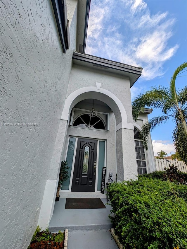 335 SW 183rd Way, Pembroke Pines, FL 33029 - doorway to property with stucco siding