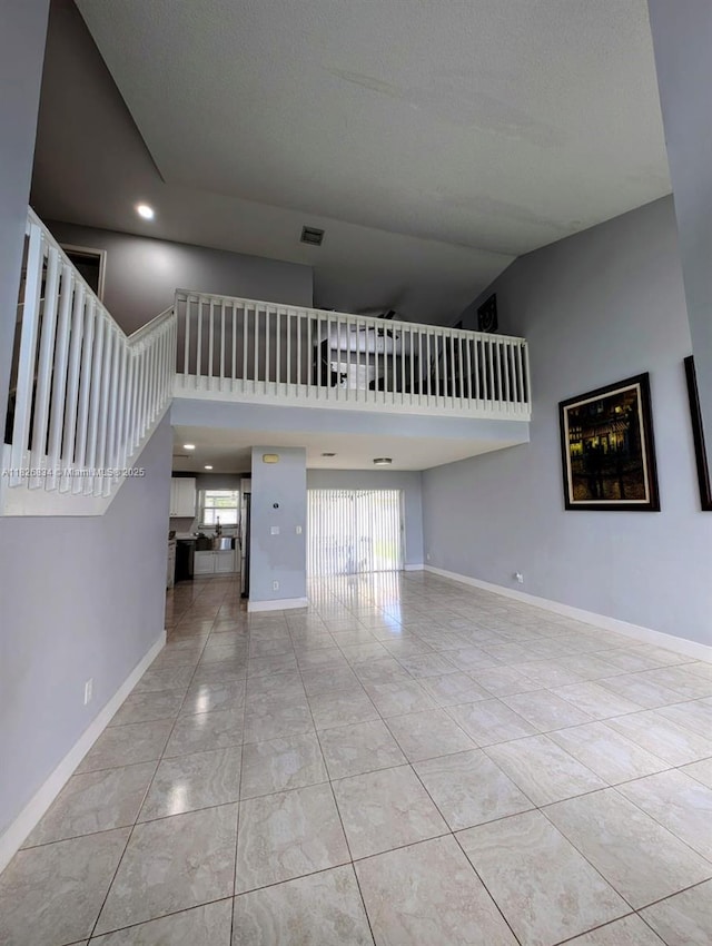 335 SW 183rd Way, Pembroke Pines, FL 33029 - unfurnished living room featuring high vaulted ceiling and recessed lighting