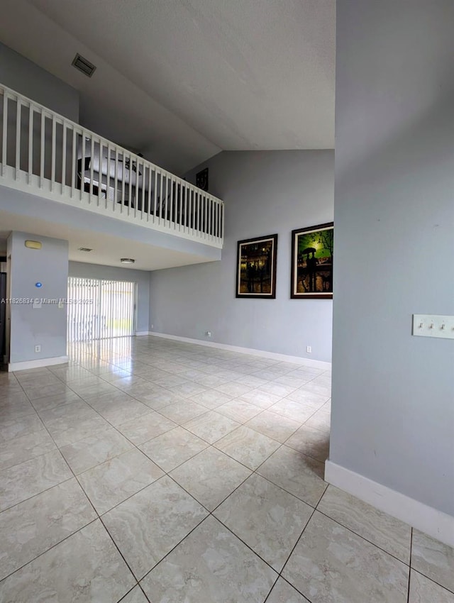 335 SW 183rd Way, Pembroke Pines, FL 33029 - unfurnished room featuring high vaulted ceiling and tile patterned flooring
