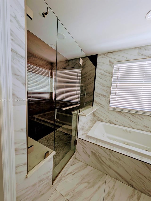 335 SW 183rd Way, Pembroke Pines, FL 33029 - bathroom featuring a whirlpool tub, a shower stall, and marble finish flooring