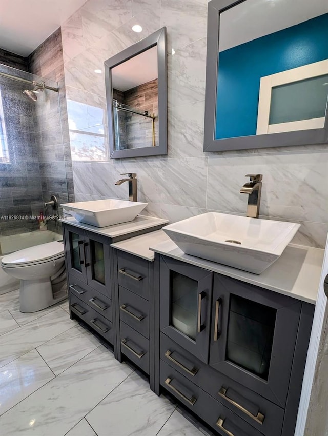 335 SW 183rd Way, Pembroke Pines, FL 33029 - full bathroom with tile walls, double vanity,  shower combination, and marble look tile flooring