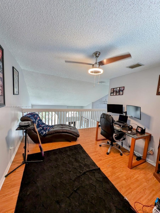 335 SW 183rd Way, Pembroke Pines, FL 33029 - office area featuring a ceiling fan, a textured ceiling, and light wood finished floors