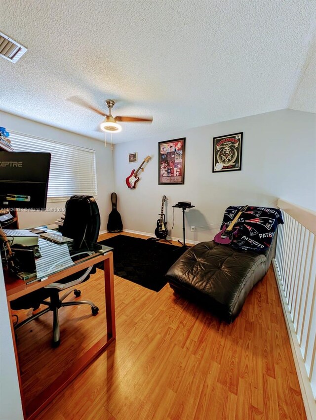 335 SW 183rd Way, Pembroke Pines, FL 33029 - office area featuring a textured ceiling, light wood-style flooring, and ceiling fan
