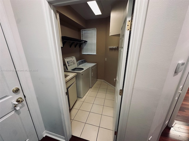 3125 Stonewater Dr Lakeland Fl, Lakeland Fl, FL 33803 - kitchen featuring washing machine and dryer, light tile patterned floors, light countertops, and open shelves