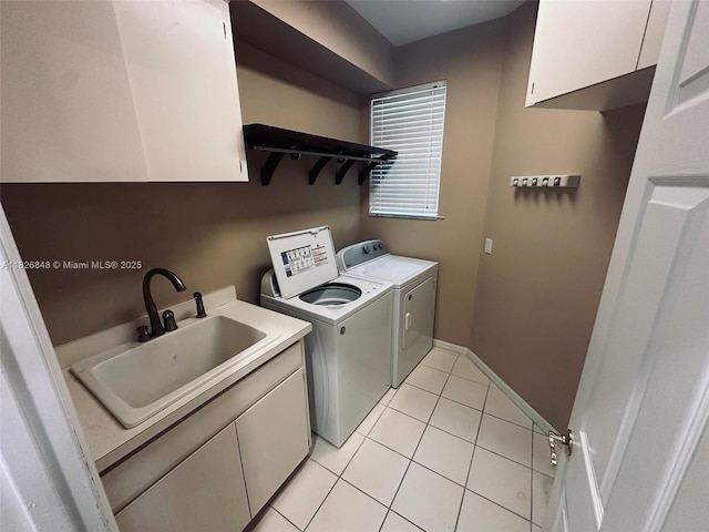 3125 Stonewater Dr Lakeland Fl, Lakeland Fl, FL 33803 - laundry area with cabinet space, washer and dryer, and light tile patterned floors